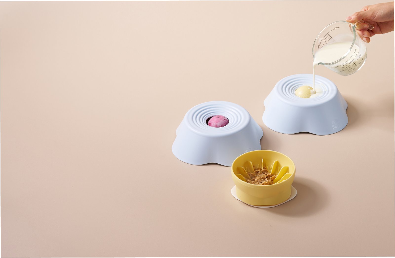 Three Morsetto enrichment bowls used for pouring, freezing and spreading treats